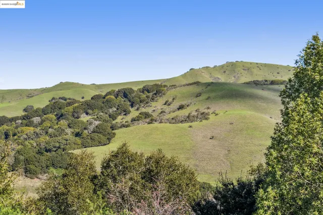 a view of a lake with mountains in the background