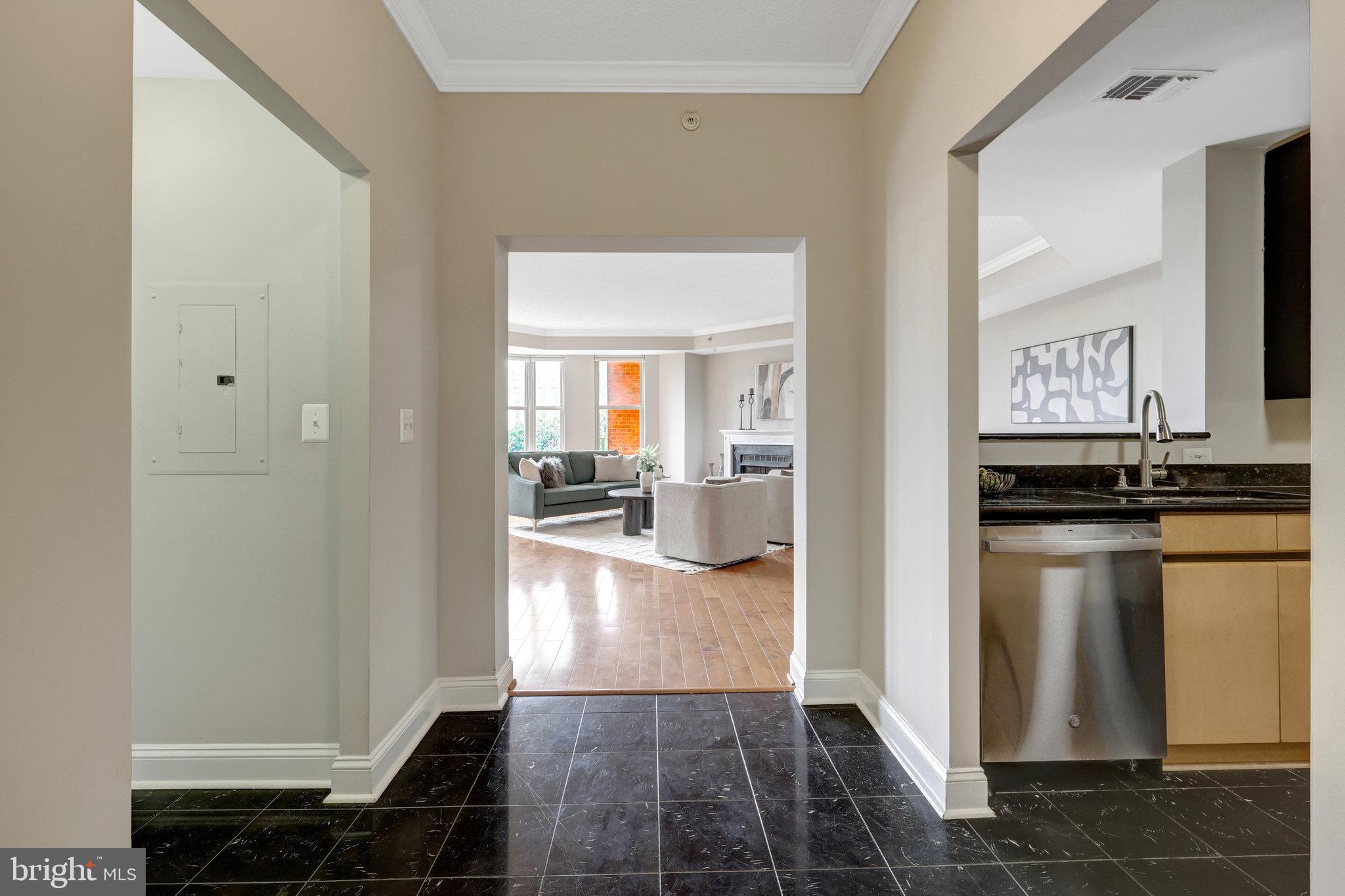 11776 Stratford House Place, Unit 601 Reston, VA 20190 - Photo 12 of 58 a view of a kitchen from the hallway