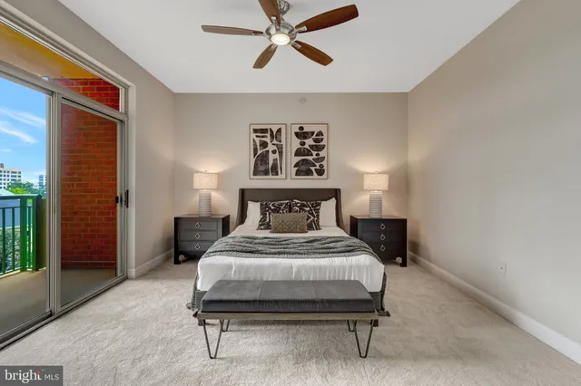 a bedroom with a bed and window