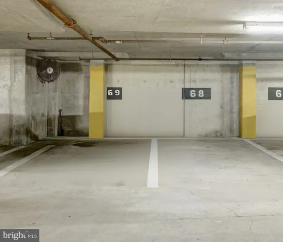a living room with furniture window and wooden floor