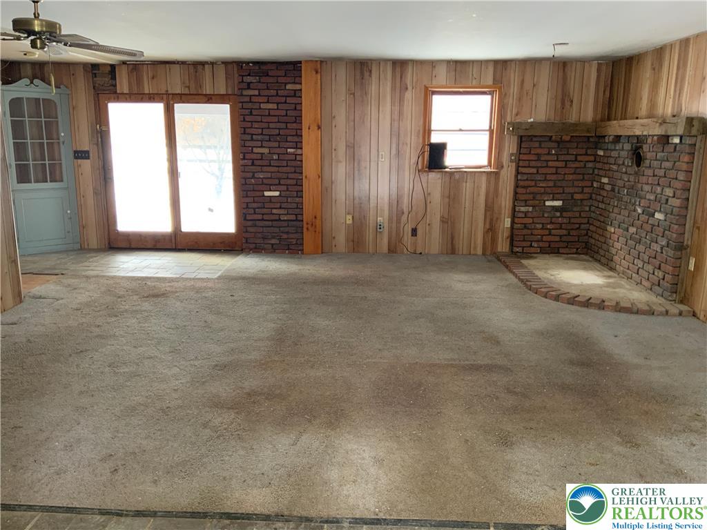 580 Gilbert Road Gilbert, PA 18331 - Photo 4 of 11 a view of an empty room with a window