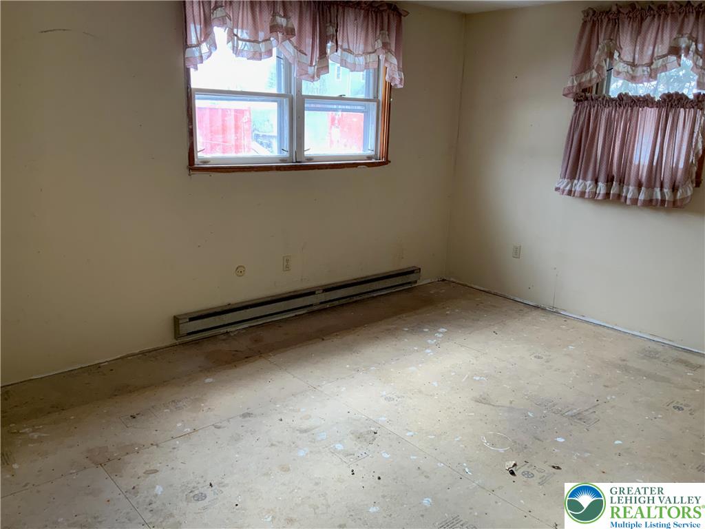 580 Gilbert Road Gilbert, PA 18331 - Photo 9 of 11 a view of a room with windows