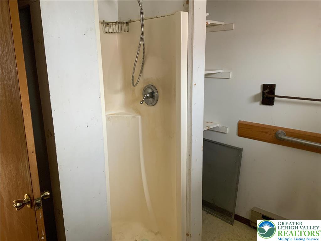 580 Gilbert Road Gilbert, PA 18331 - Photo 10 of 11 a bathroom with a shower