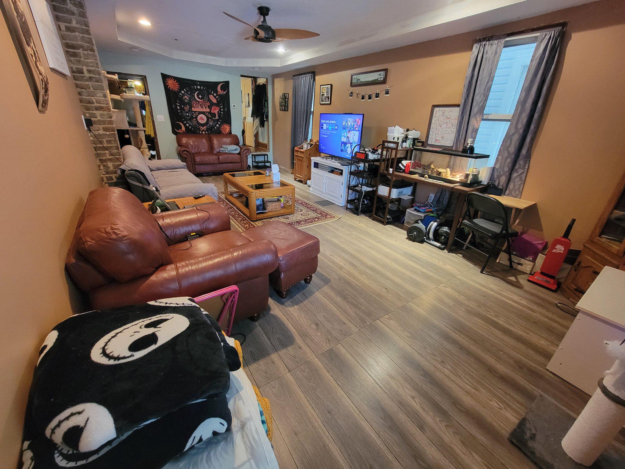 1128 Baltimore Street Hanover, PA 17331 - Photo 5 of 16 Cozy living space with warm tones.