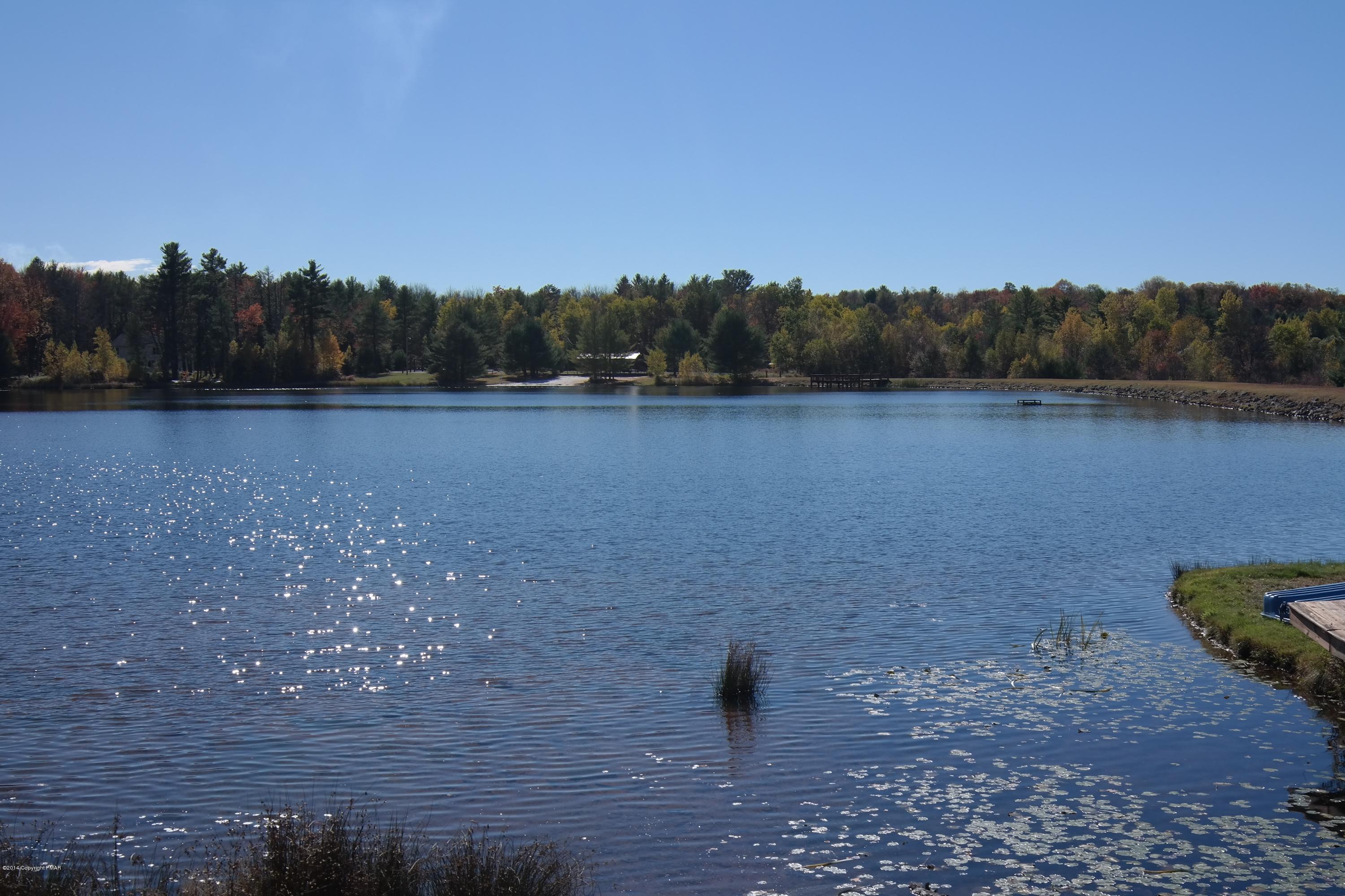 7 Lidio Road Blakeslee, PA 18610 - Photo 4 of 5 a view of a lake with houses in the background