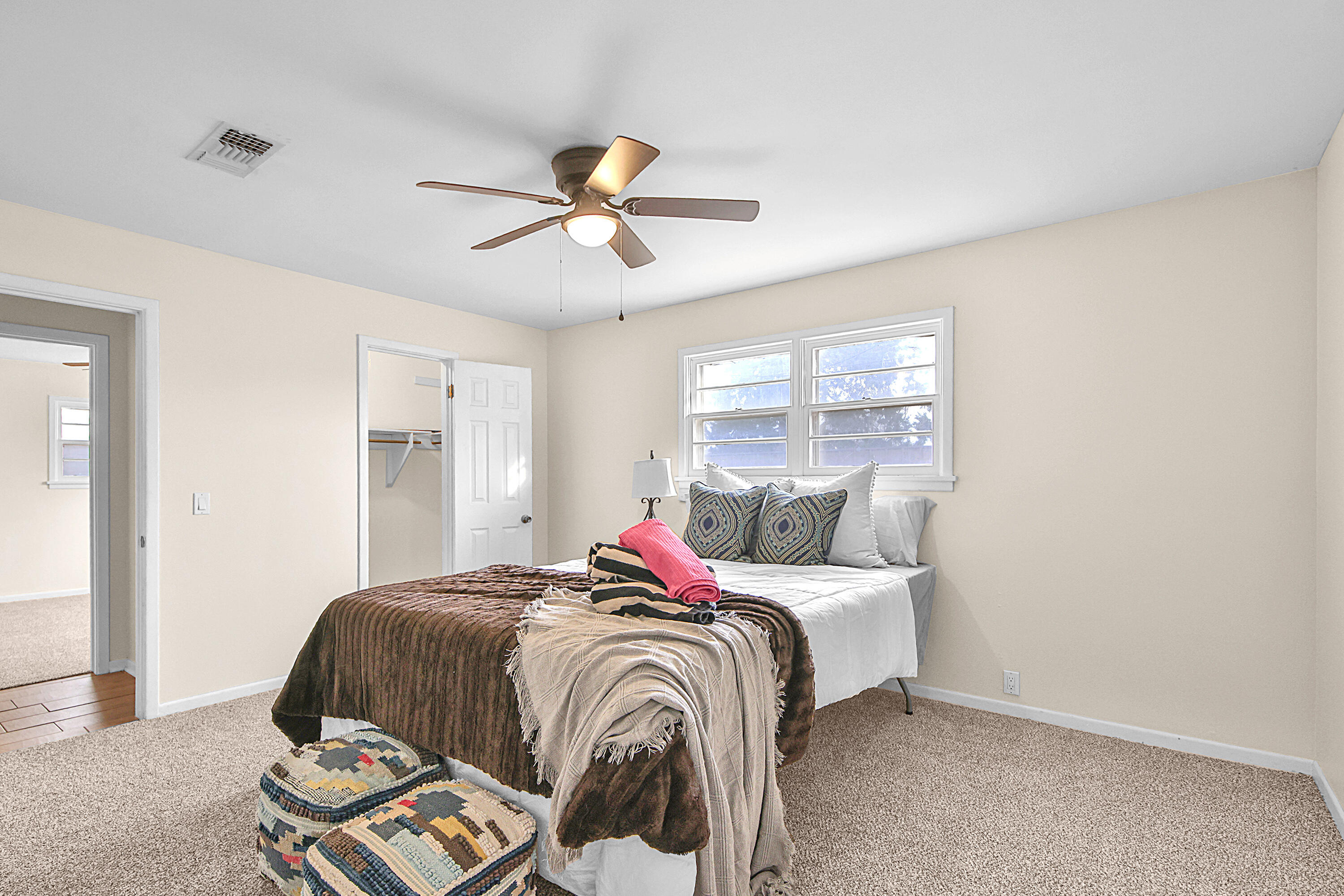 4513 48th Street Lubbock, TX 79414 - Photo 22 of 55 a bedroom with a bed and a window