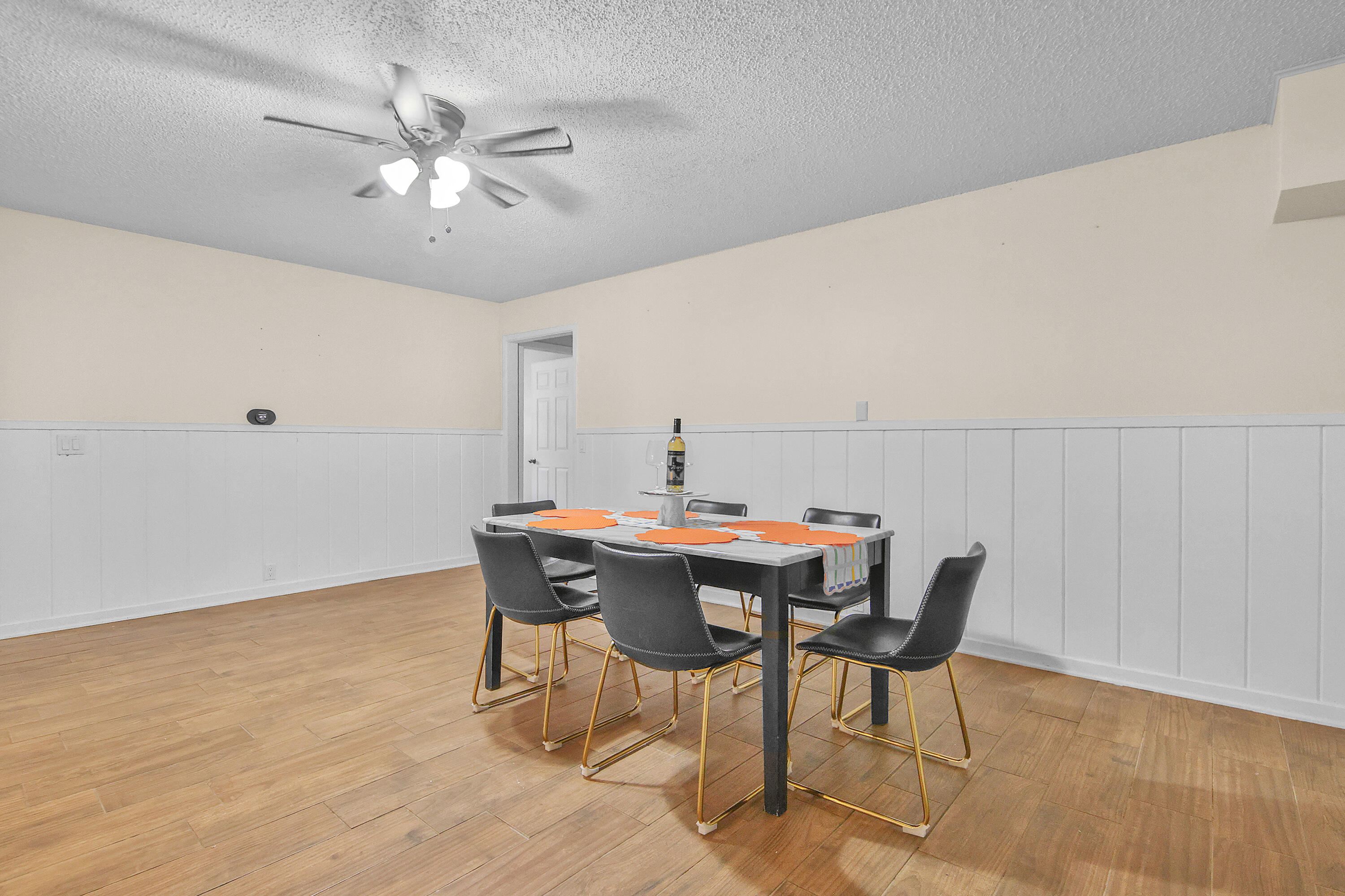 4513 48th Street Lubbock, TX 79414 - Photo 42 of 55 a view of a dining room with furniture and wooden floor