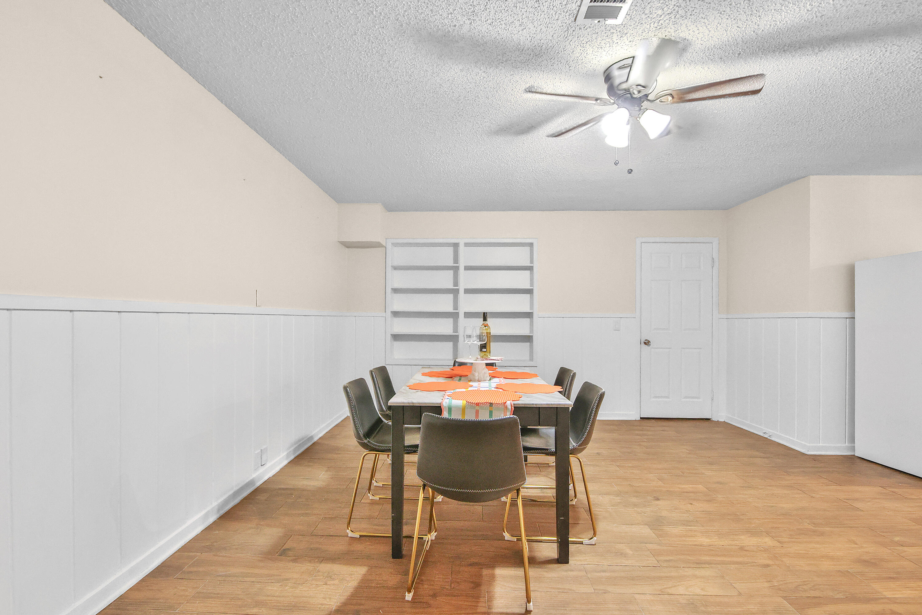 4513 48th Street Lubbock, TX 79414 - Photo 43 of 55 a view of a dining room with furniture and a chandelier fan