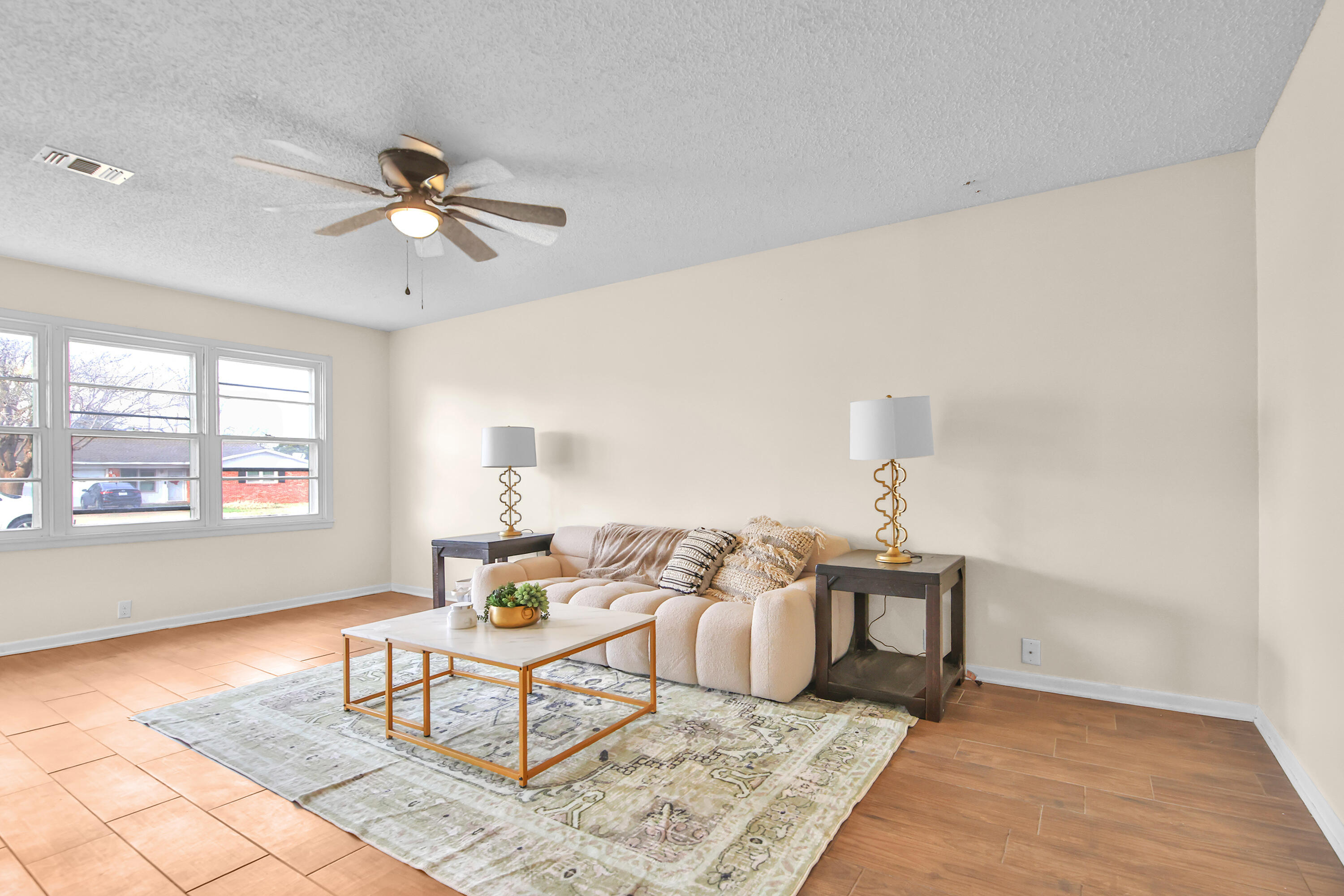 4513 48th Street Lubbock, TX 79414 - Photo 46 of 55 a living room with furniture a rug and a window