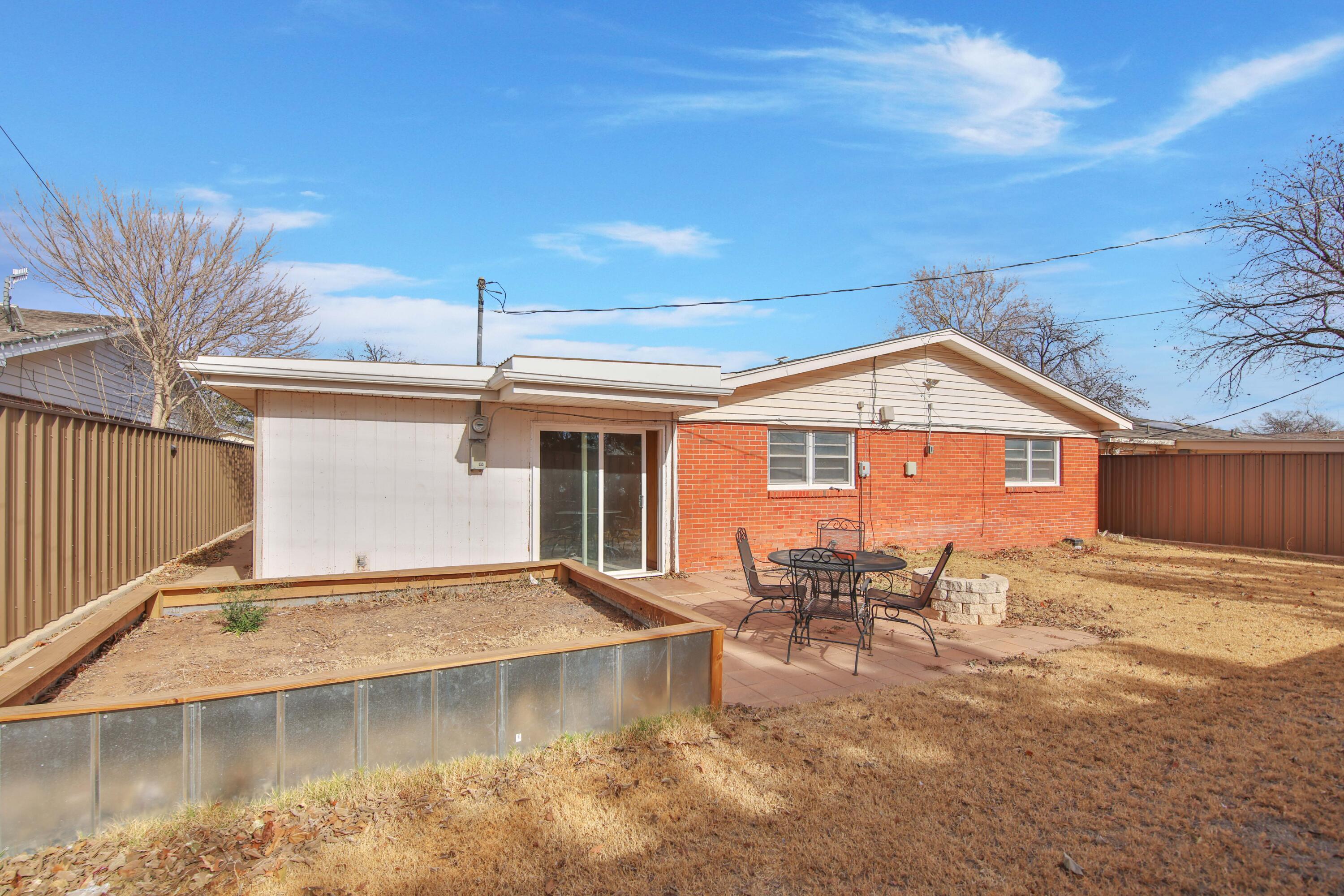 4513 48th Street Lubbock, TX 79414 - Photo 53 of 55 a view of a house with pool and chairs