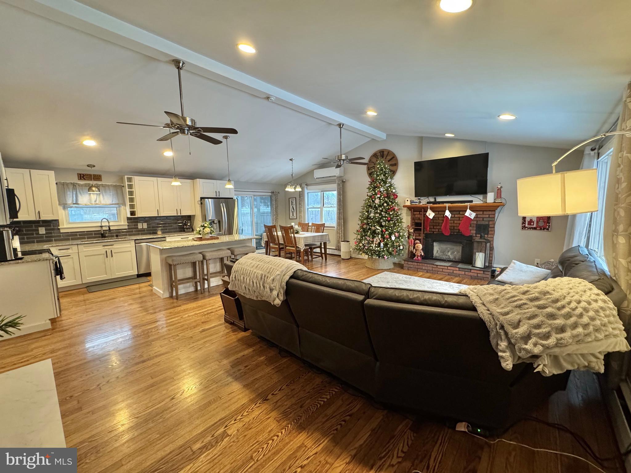 699 Honey Creek Road Reedsville, PA 17084 - Photo 2 of 26 a living room with furniture and a flat screen tv