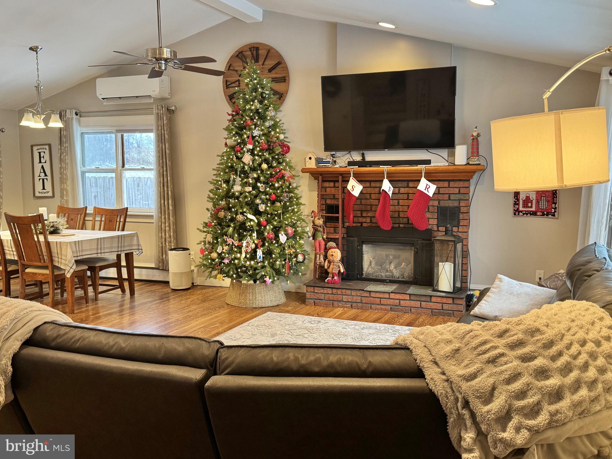699 Honey Creek Road Reedsville, PA 17084 - Photo 3 of 26 a living room with furniture and a flat screen tv