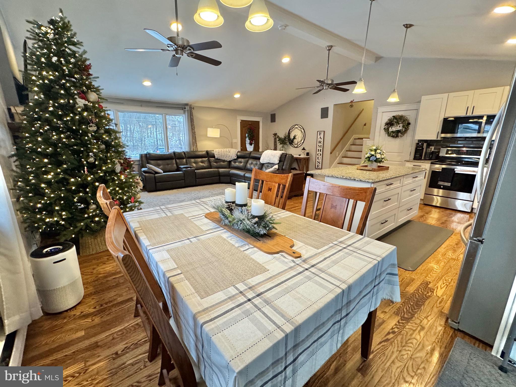 699 Honey Creek Road Reedsville, PA 17084 - Photo 6 of 26 a view of a dining room with furniture window and wooden floor