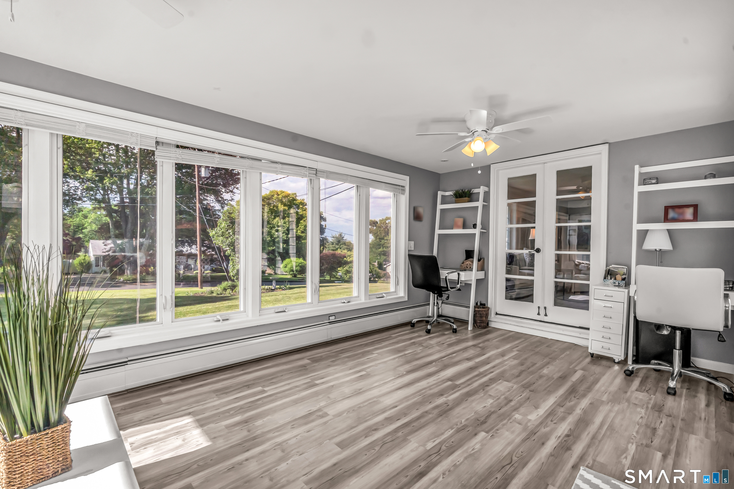 13 Pleasant Rise Circle Brookfield, CT 06804 - Photo 29 of 40 a view of a room with furniture wooden floor and windows