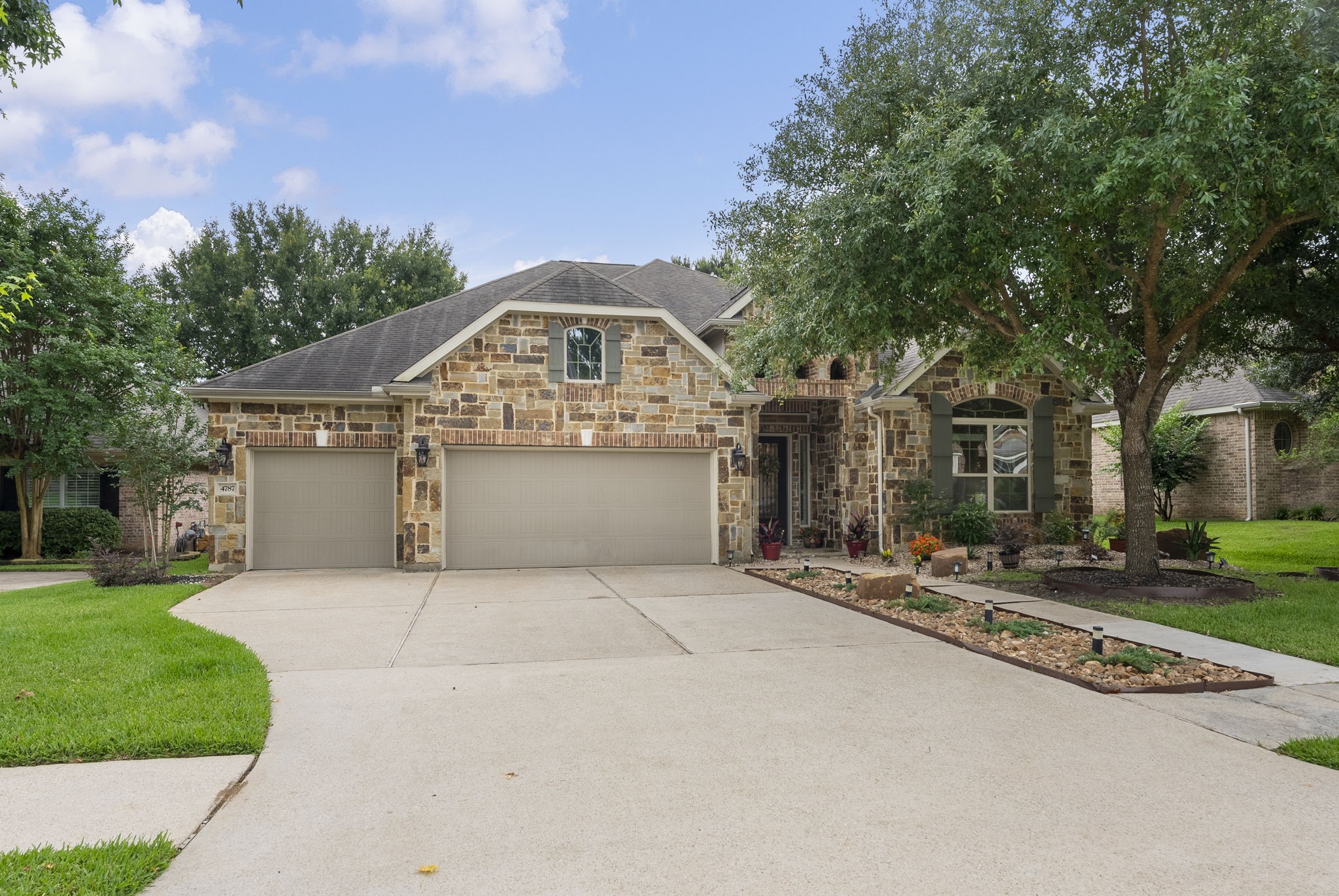 4787 Jackson Square Drive Conroe, TX 77304 - Photo 2 of 35 Step into this stunning single-story retreat that perfectly blends comfort, functionality, and room to roam! With 4 generously sized bedrooms, a dedicated study, and a spacious game room, this home effortlessly caters to families, remote professionals, and entertainers alike.