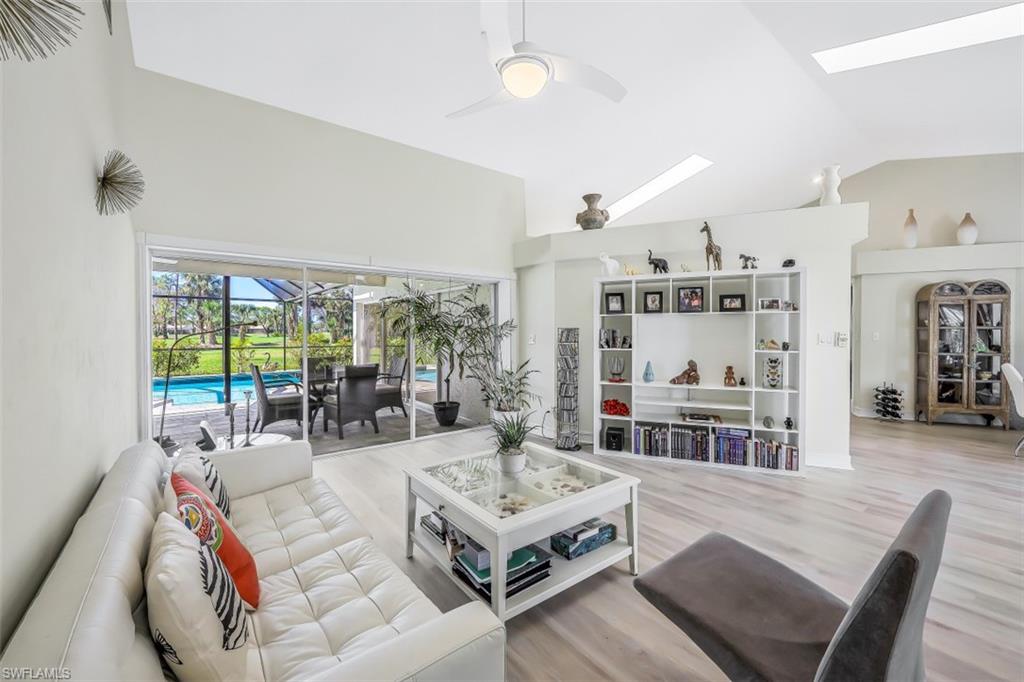 2016 Duke Drive Naples, FL 34110 - Photo 3 of 23 a living room with furniture and a large window