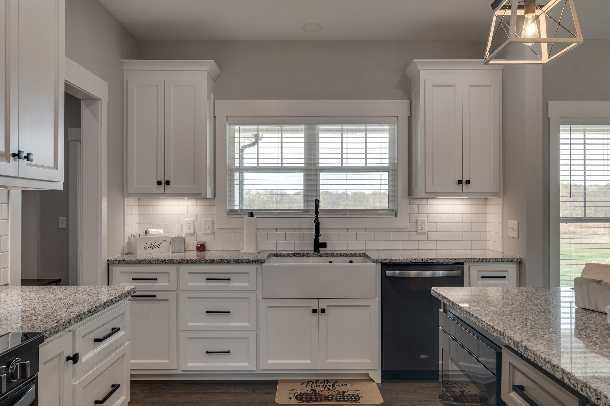 947 South Cross Bridges Road Mount Pleasant, TN 38474 - Photo 15 of 37 a kitchen with granite countertop a sink stainless steel appliances and cabinets