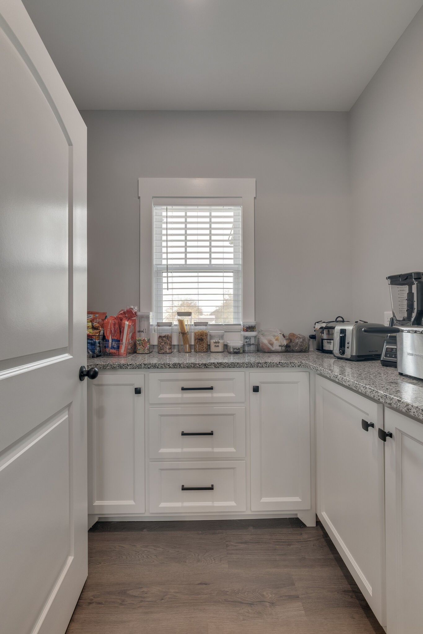 947 South Cross Bridges Road Mount Pleasant, TN 38474 - Photo 17 of 37 a kitchen with granite countertop white cabinets and white appliances