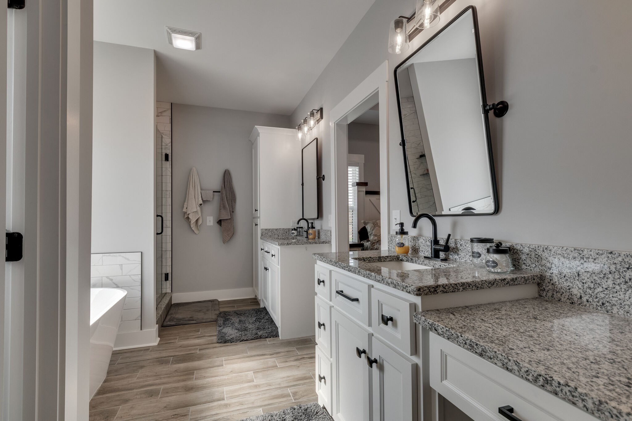 947 South Cross Bridges Road Mount Pleasant, TN 38474 - Photo 21 of 37 a bathroom with a granite countertop sink and a mirror