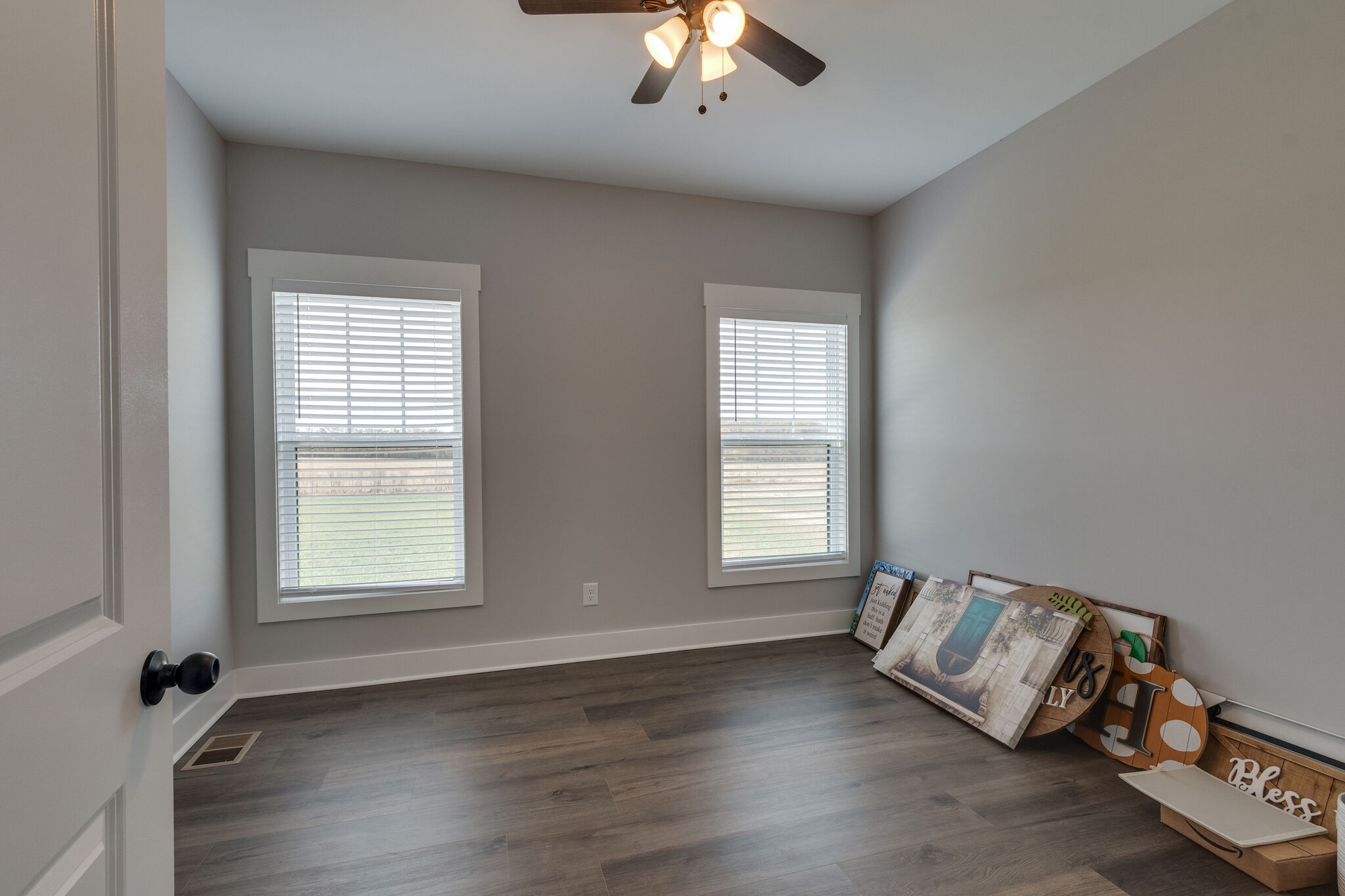 947 South Cross Bridges Road Mount Pleasant, TN 38474 - Photo 27 of 37 a view of an empty room with wooden floor and a window