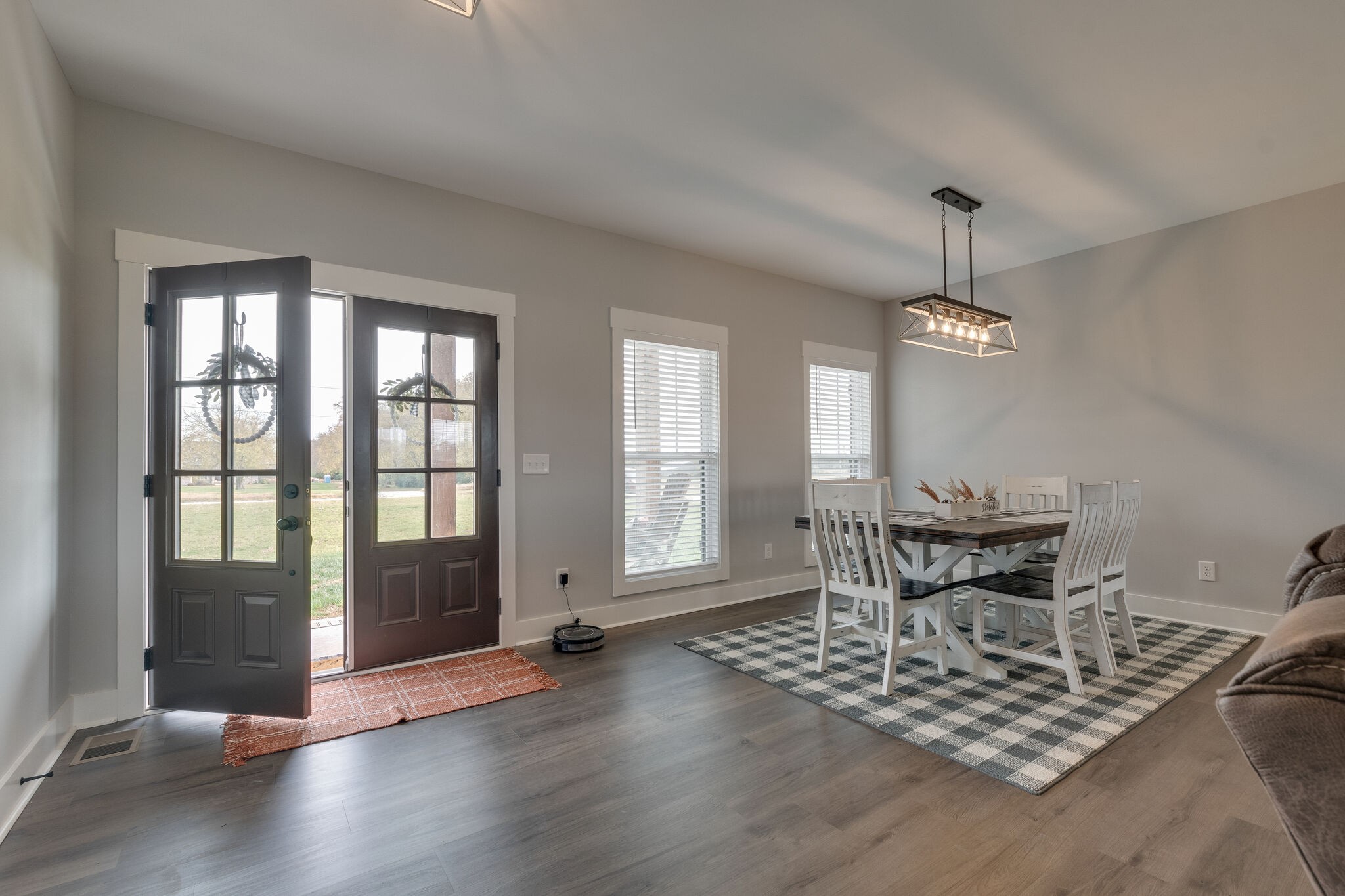 947 South Cross Bridges Road Mount Pleasant, TN 38474 - Photo 5 of 37 a view of a livingroom with furniture wooden floor and a chandelier
