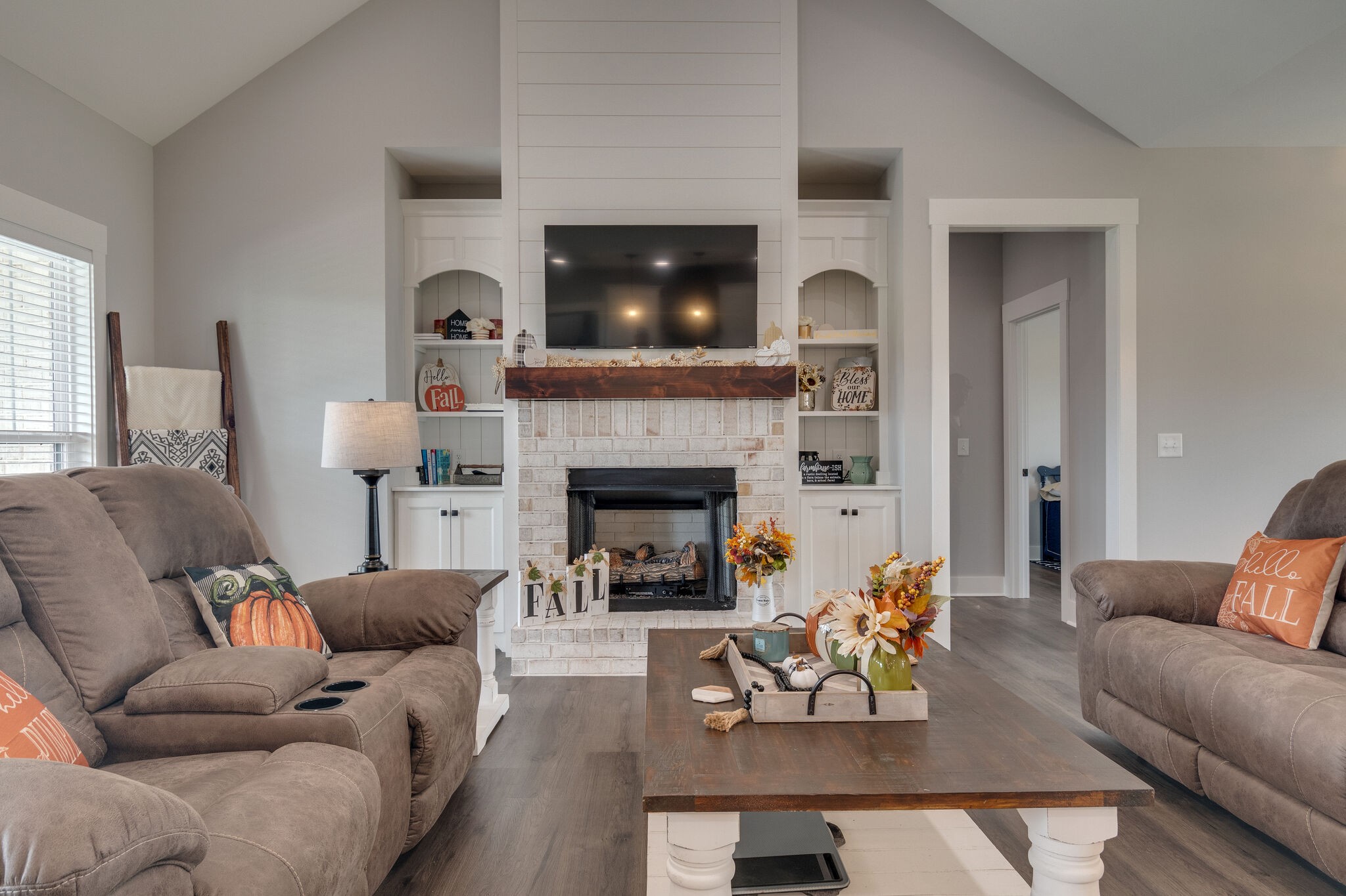 947 South Cross Bridges Road Mount Pleasant, TN 38474 - Photo 9 of 37 a living room with furniture and a fireplace
