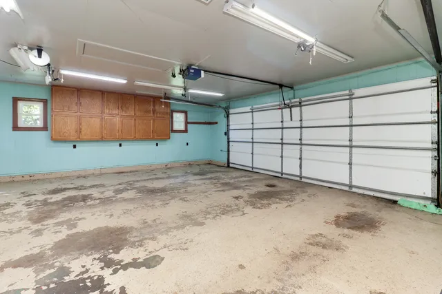 a kitchen with a stove a sink and a refrigerator