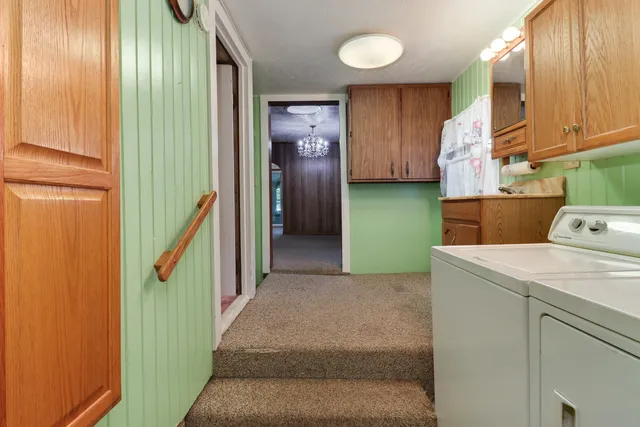 a kitchen with stainless steel appliances granite countertop a stove and a sink