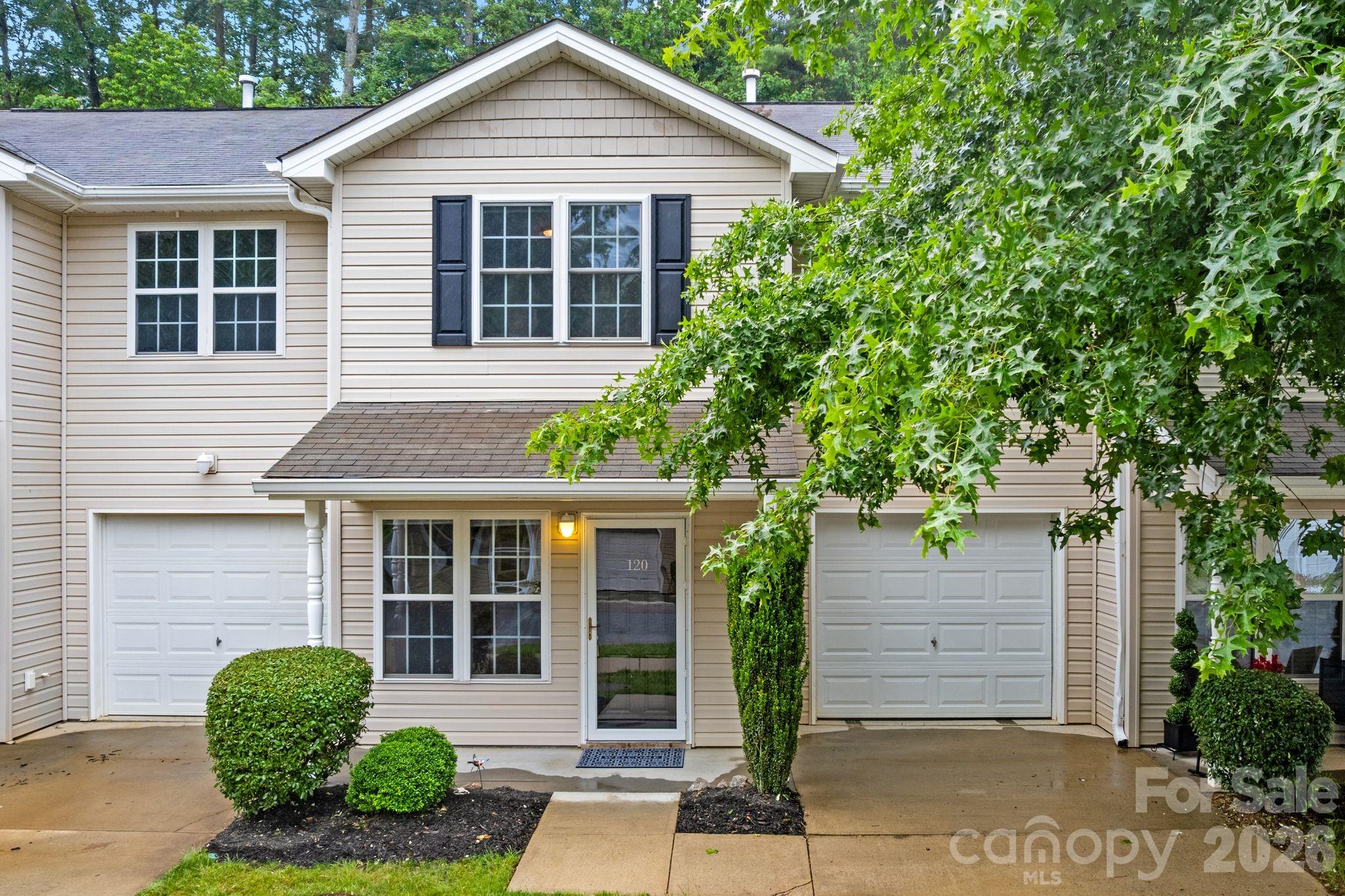 120 Alpine Ridge Drive Asheville, NC 28803 - Photo 1 of 28 a view of a house with a yard and plants