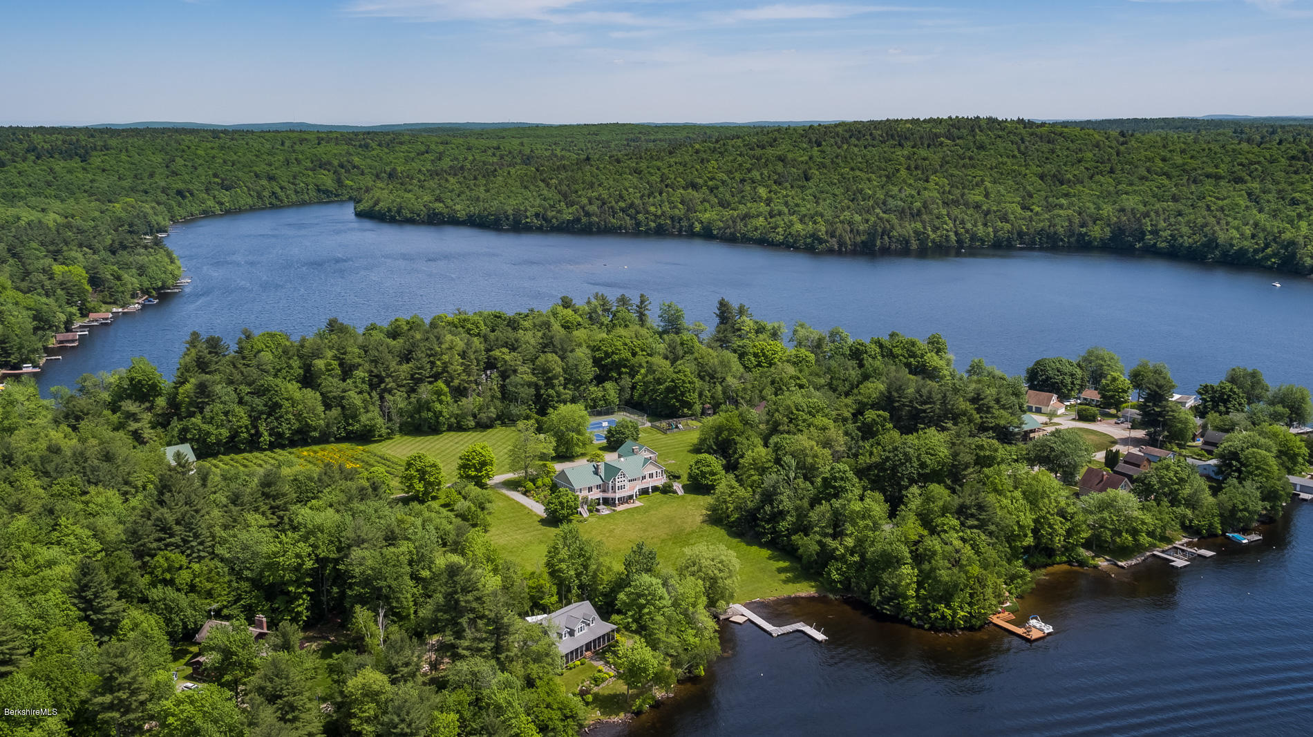 305 Moreau Road Tolland, MA 01034 - Photo 2 of 49 an aerial view of a house with a yard