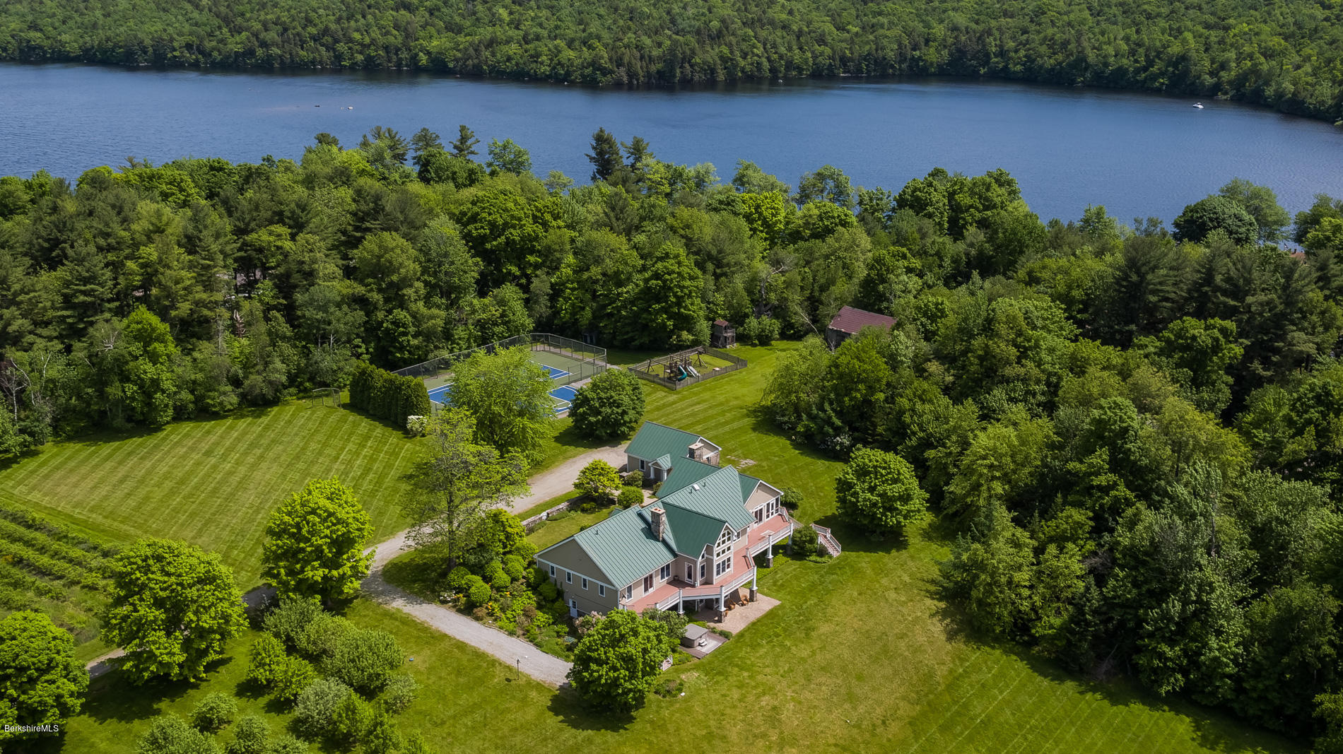 305 Moreau Road Tolland, MA 01034 - Photo 11 of 49 an aerial view of a house with a yard basket ball court and outdoor seating