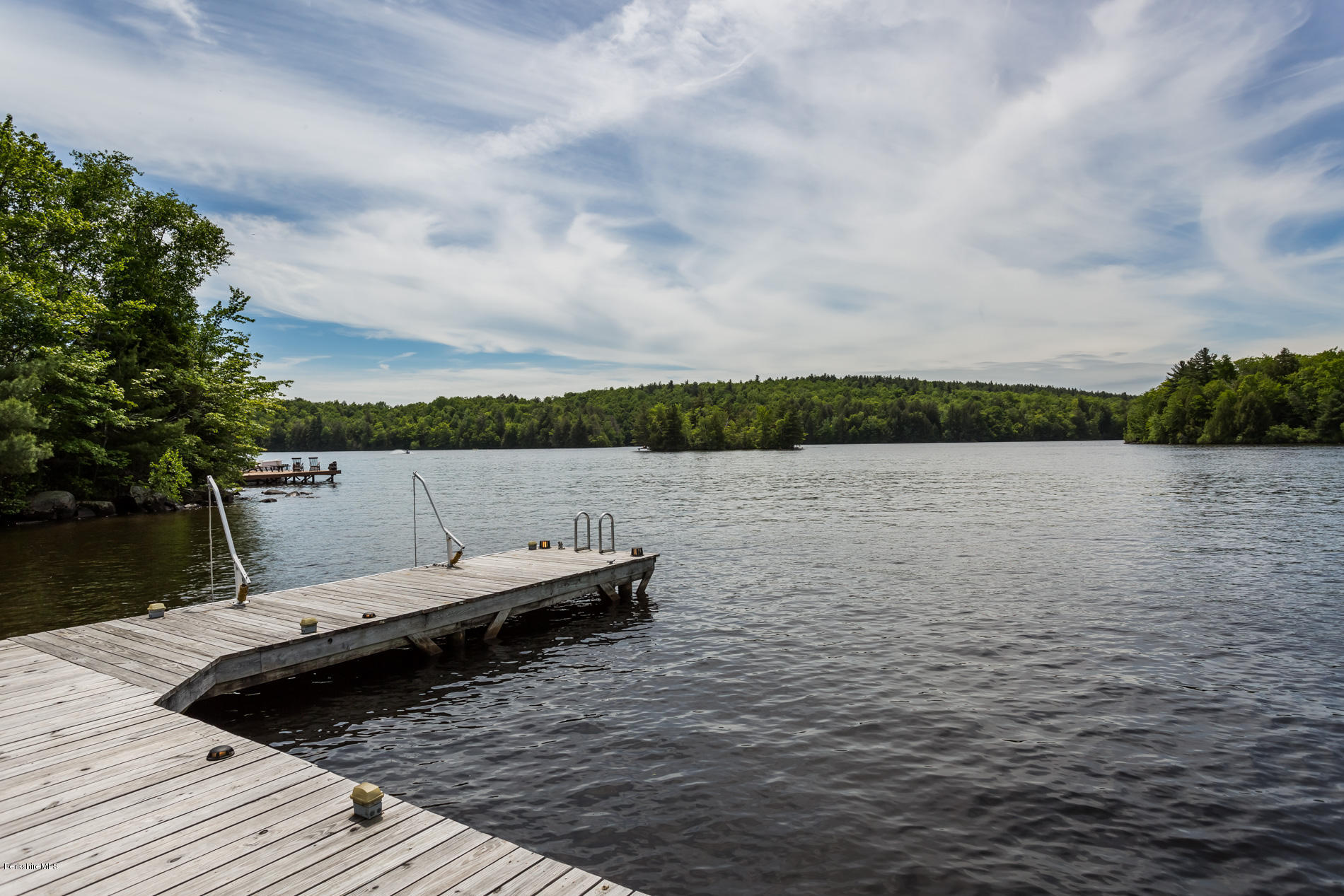 305 Moreau Road Tolland, MA 01034 - Photo 14 of 49 a view of a lake with houses