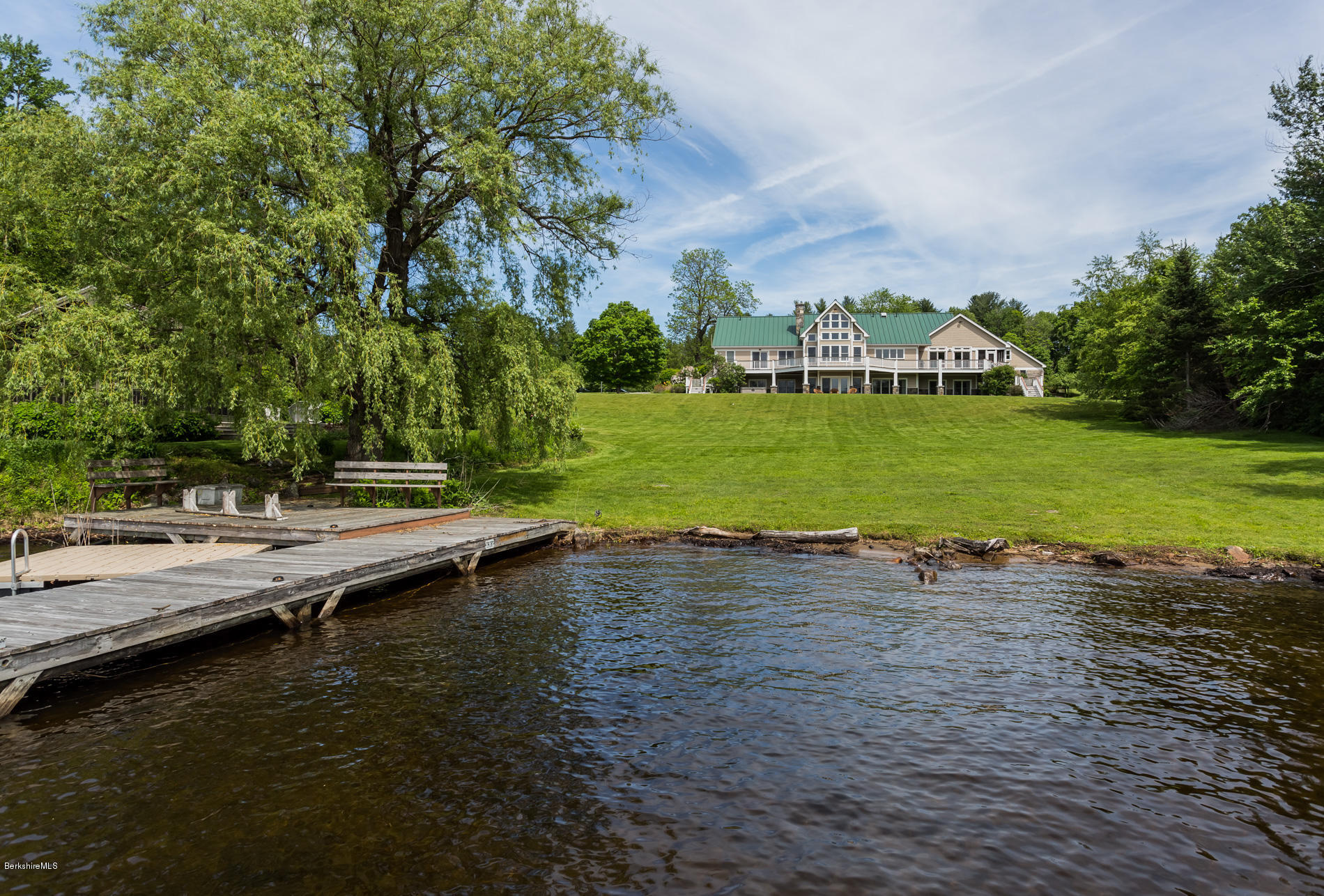 305 Moreau Road Tolland, MA 01034 - Photo 15 of 49 a view of a swimming pool and a yard