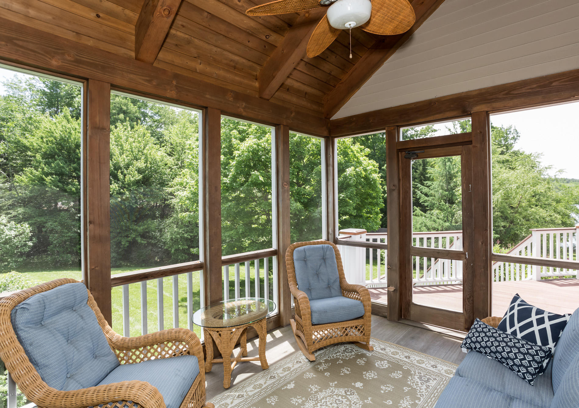 305 Moreau Road Tolland, MA 01034 - Photo 21 of 49 a living room with furniture and a floor to ceiling window