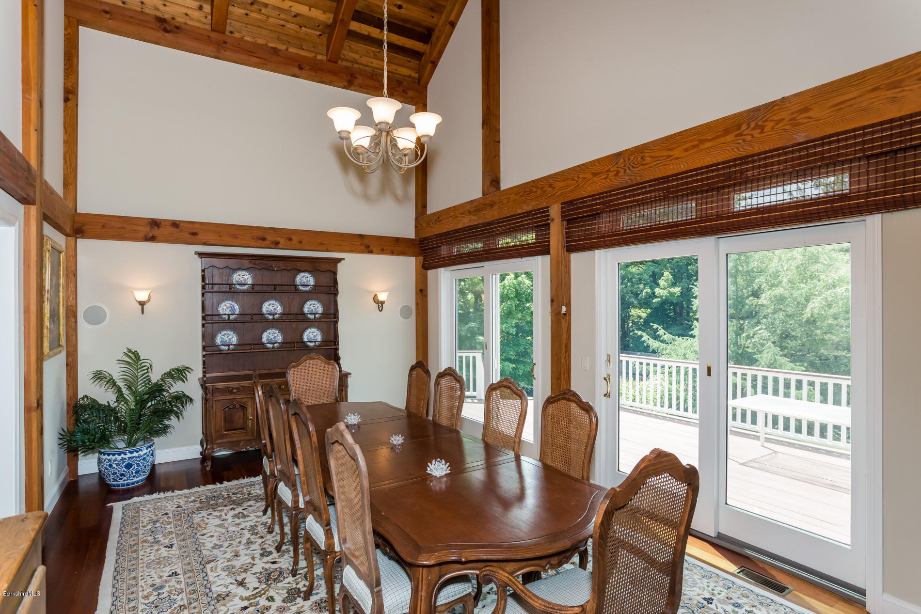 305 Moreau Road Tolland, MA 01034 - Photo 24 of 49 a view of a dining room with furniture wooden floor and chandelier