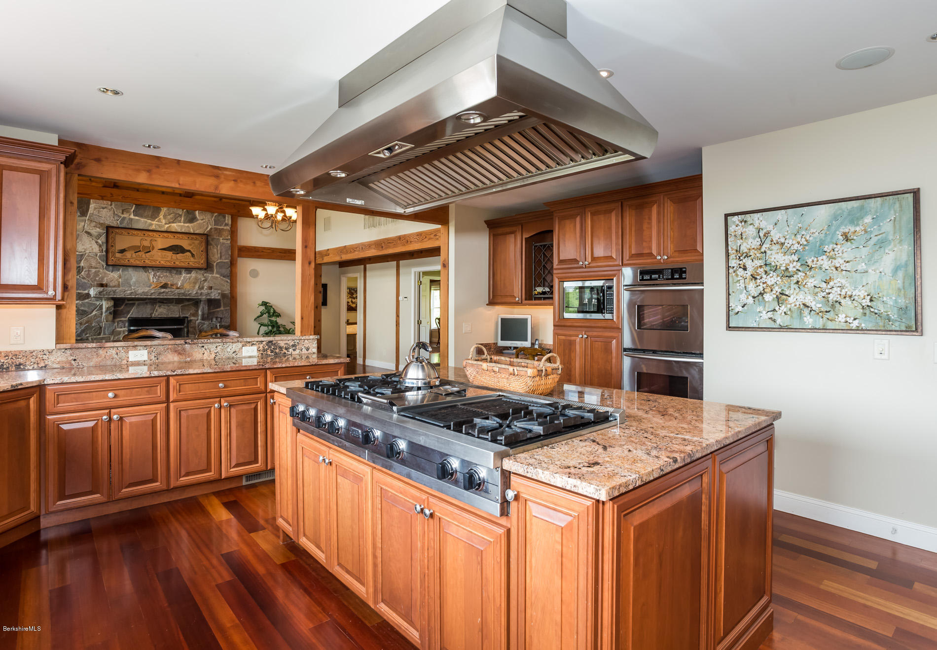 305 Moreau Road Tolland, MA 01034 - Photo 29 of 49 a kitchen with stainless steel appliances granite countertop a stove a sink dishwasher and a refrigerator