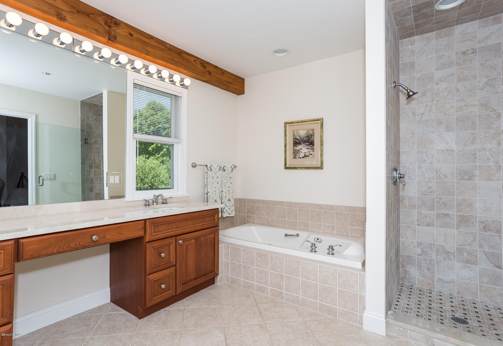 305 Moreau Road Tolland, MA 01034 - Photo 37 of 49 a bathroom with a bathtub sink and mirror