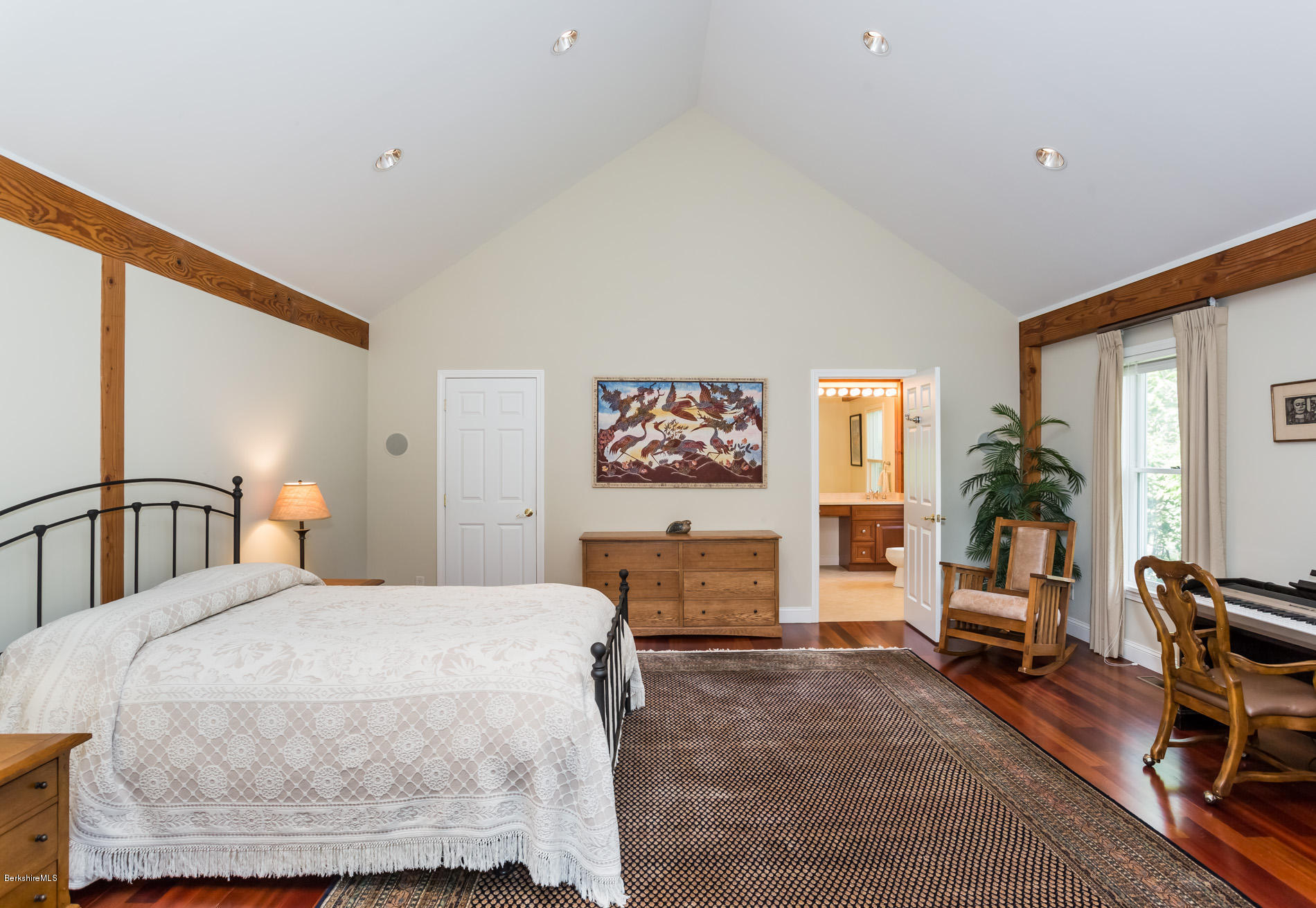 305 Moreau Road Tolland, MA 01034 - Photo 38 of 49 a bedroom with a large bed and furniture