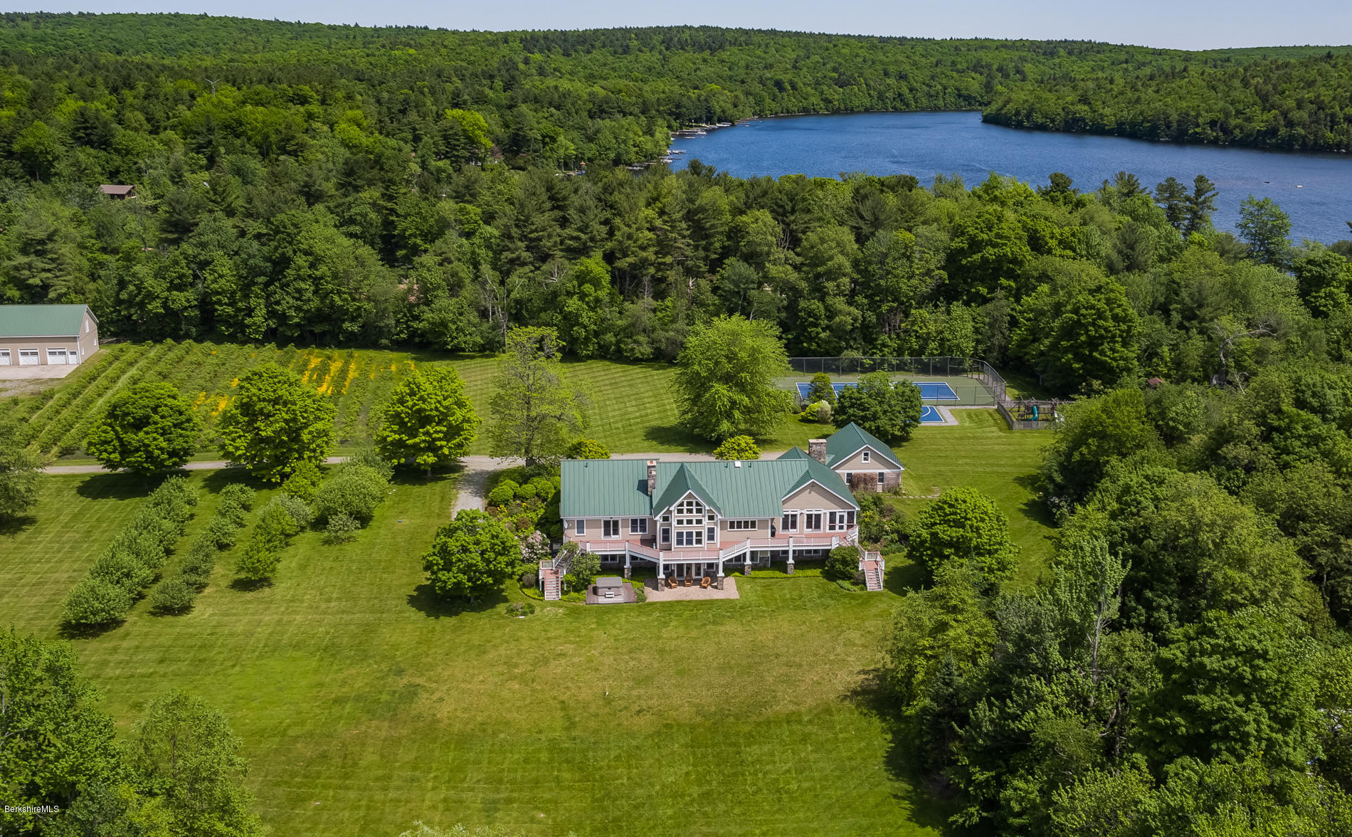 305 Moreau Road Tolland, MA 01034 - Photo 5 of 49 an aerial view of a house with a yard lake lake view and mountain view