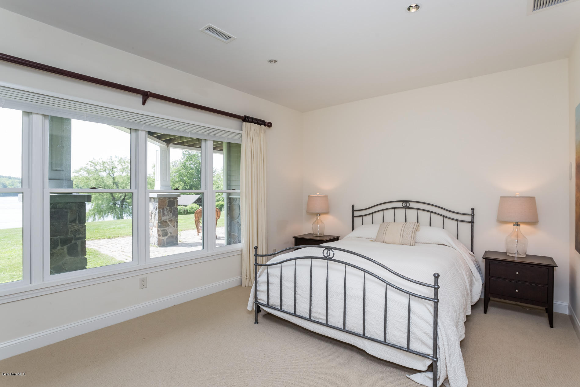 305 Moreau Road Tolland, MA 01034 - Photo 43 of 49 a bedroom with a bed and a large window