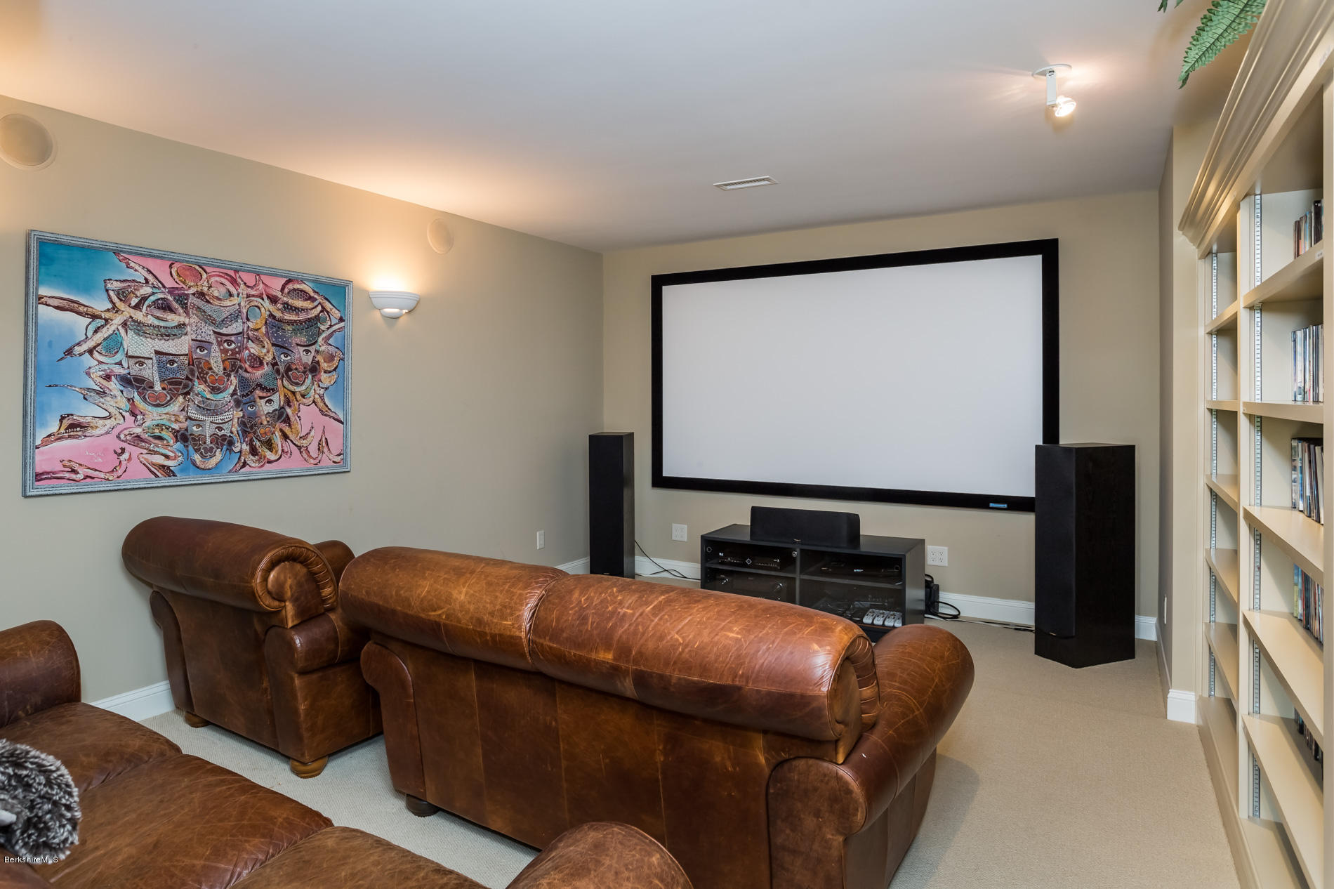 305 Moreau Road Tolland, MA 01034 - Photo 48 of 49 a room with furniture projector and screen