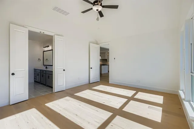 a view of an empty room and window