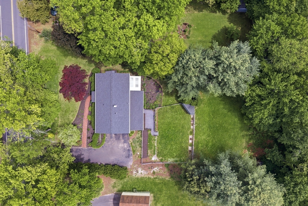 788 Burts Pit Road Northampton, MA 01062 - Photo 5 of 42 an aerial view of a house with a yard and a large tree