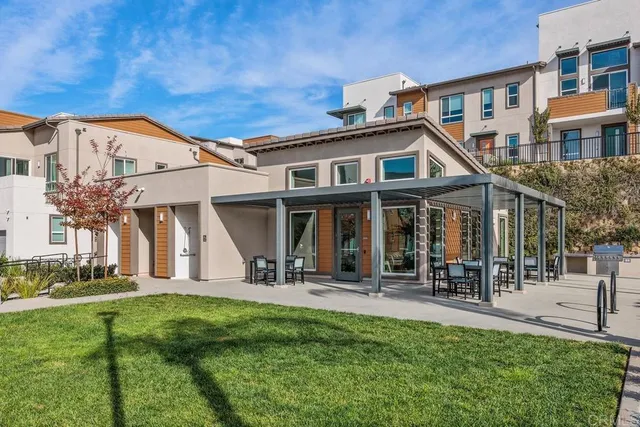 a view of a swimming pool with a patio