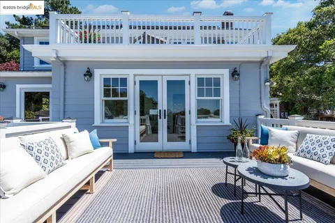 a view of staircase with white walls and a window