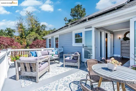 a bedroom with a bed and a mirror