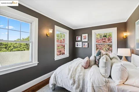 a bathroom with a sink mirror and vanity