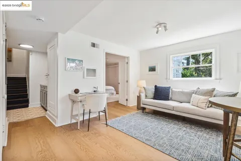 a bathroom with a toilet sink and shower