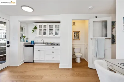 an aerial view of a house with outdoor space