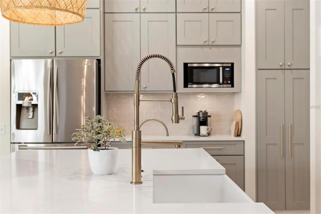 4324 Auston Way Palm Harbor, FL 34685 - Photo 11 of 54 a view of kitchen with refrigerator cabinets